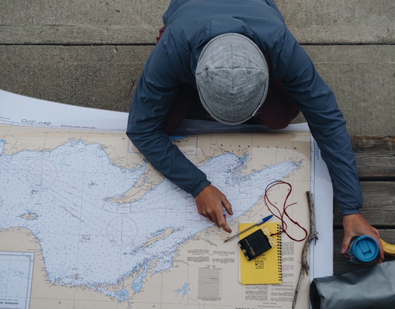Student and map of lake superior