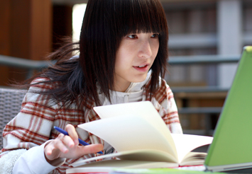 Student studying at computer