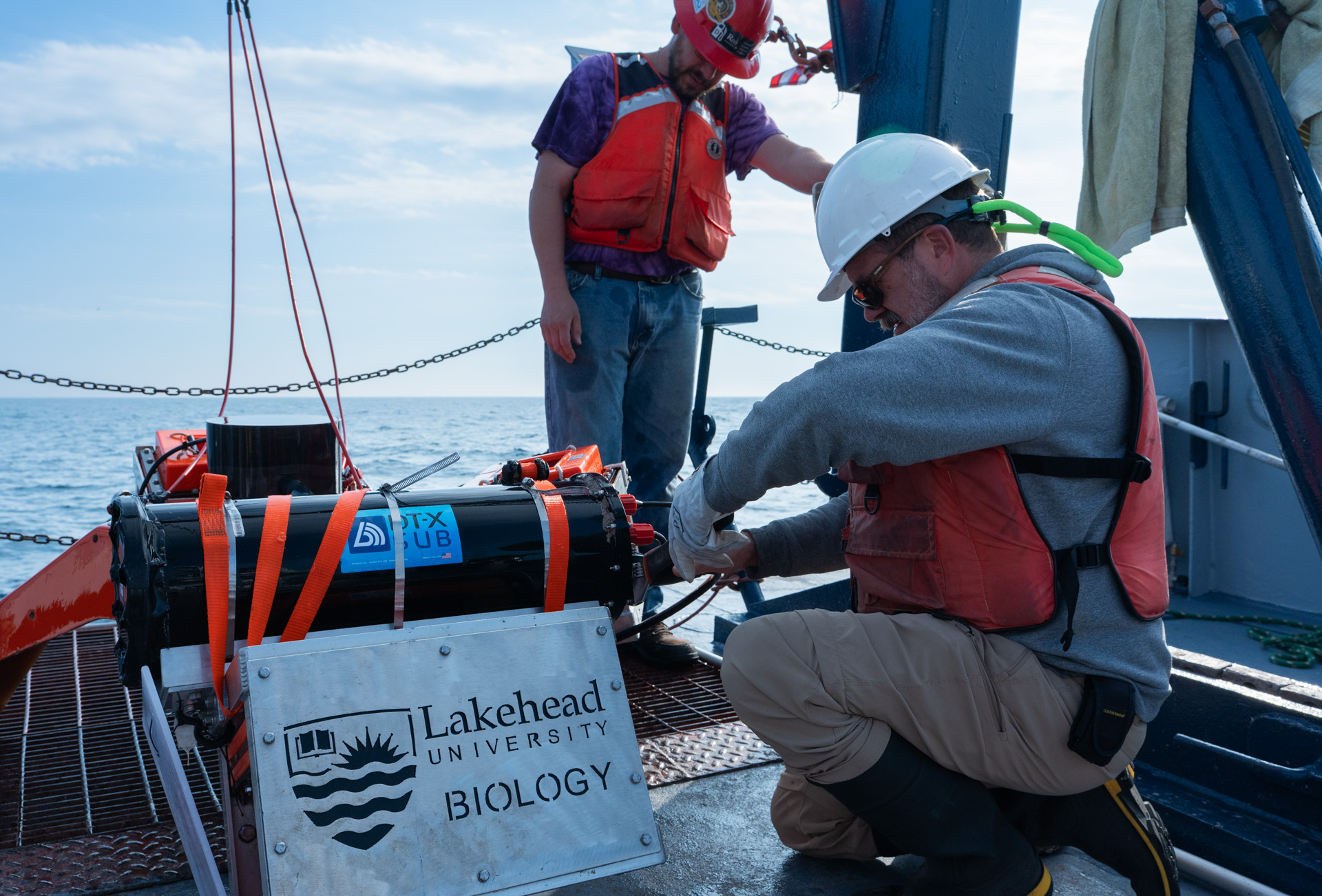 Dr. Michael Rennie Works on the Submersible Dr. Michael Rennie helps prepare the submersible on the deck of the Blue Heron