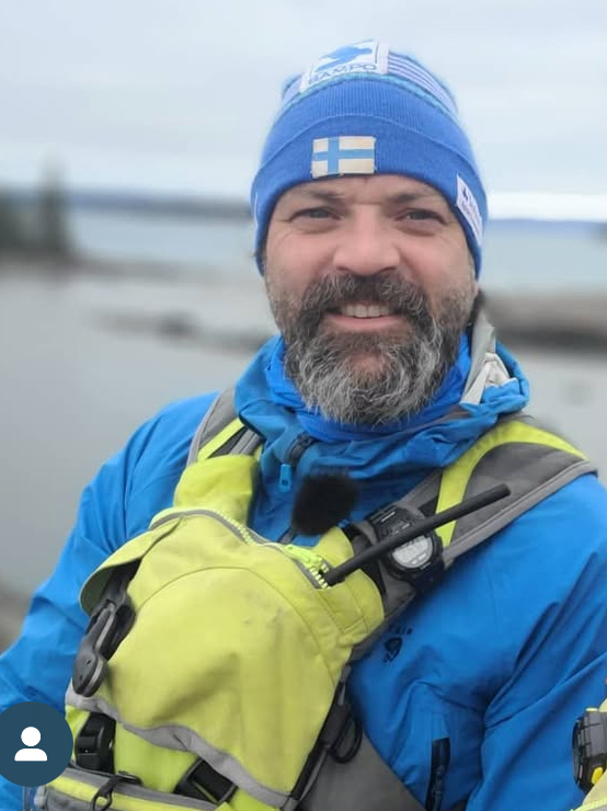 Dr. Rob Stewart Outdoors Dr. Rob Stewart on a lakeshore wearing outdoor gear and a winter toque