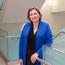 Dr. Linda Rodenburg stands in the main hallway at the Orillia Campus