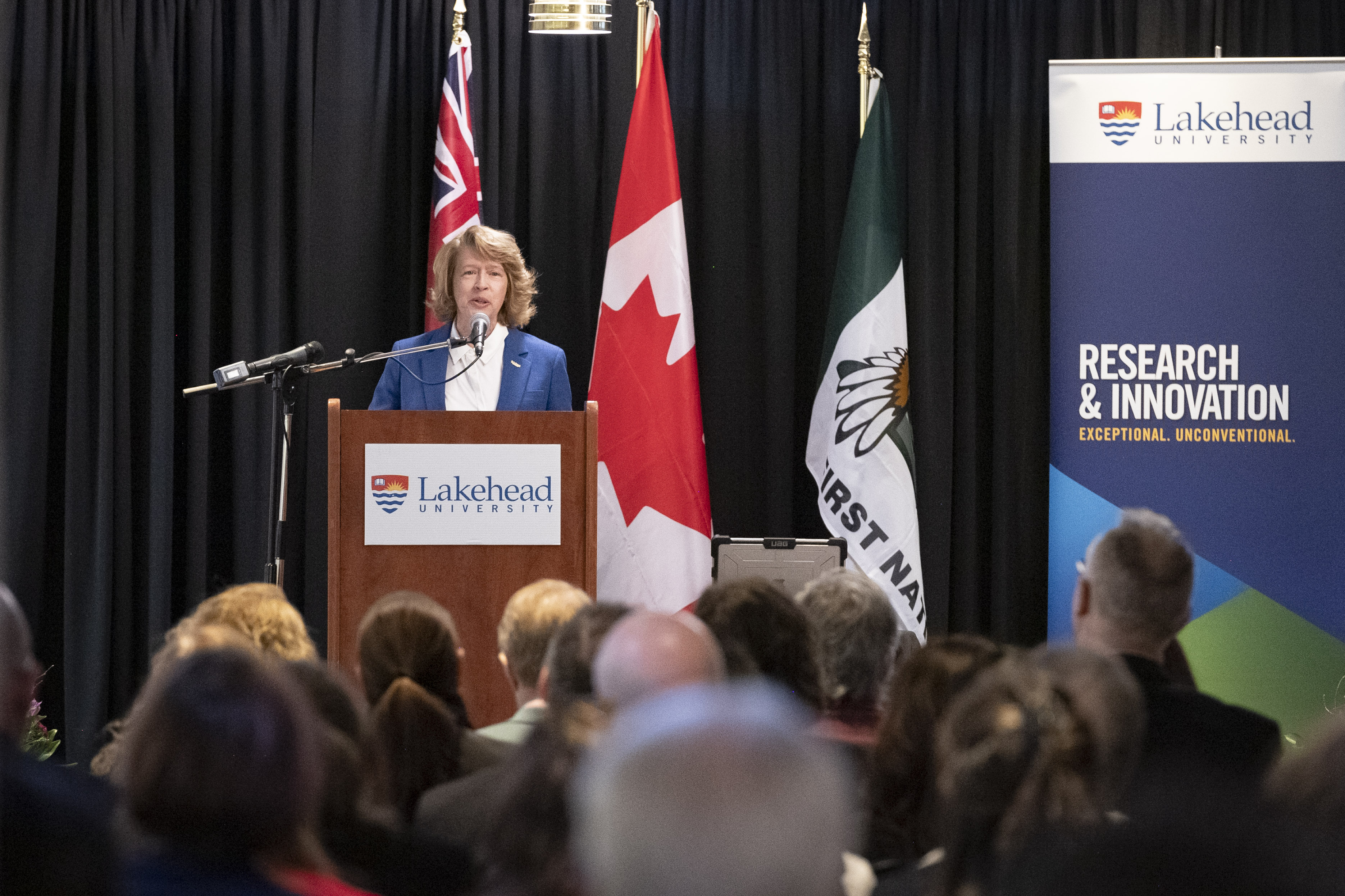 Photo of Dr. Moira McPherson, President and Vice-Chancellor, Speaking at R&I Week Opening Ceremonies