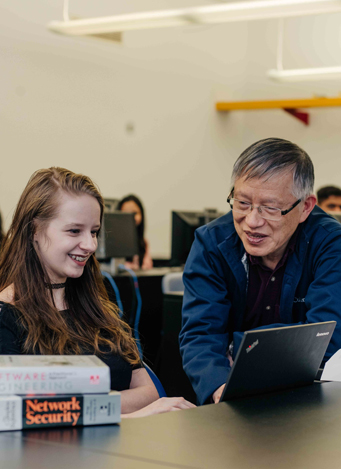 A prof helping a student