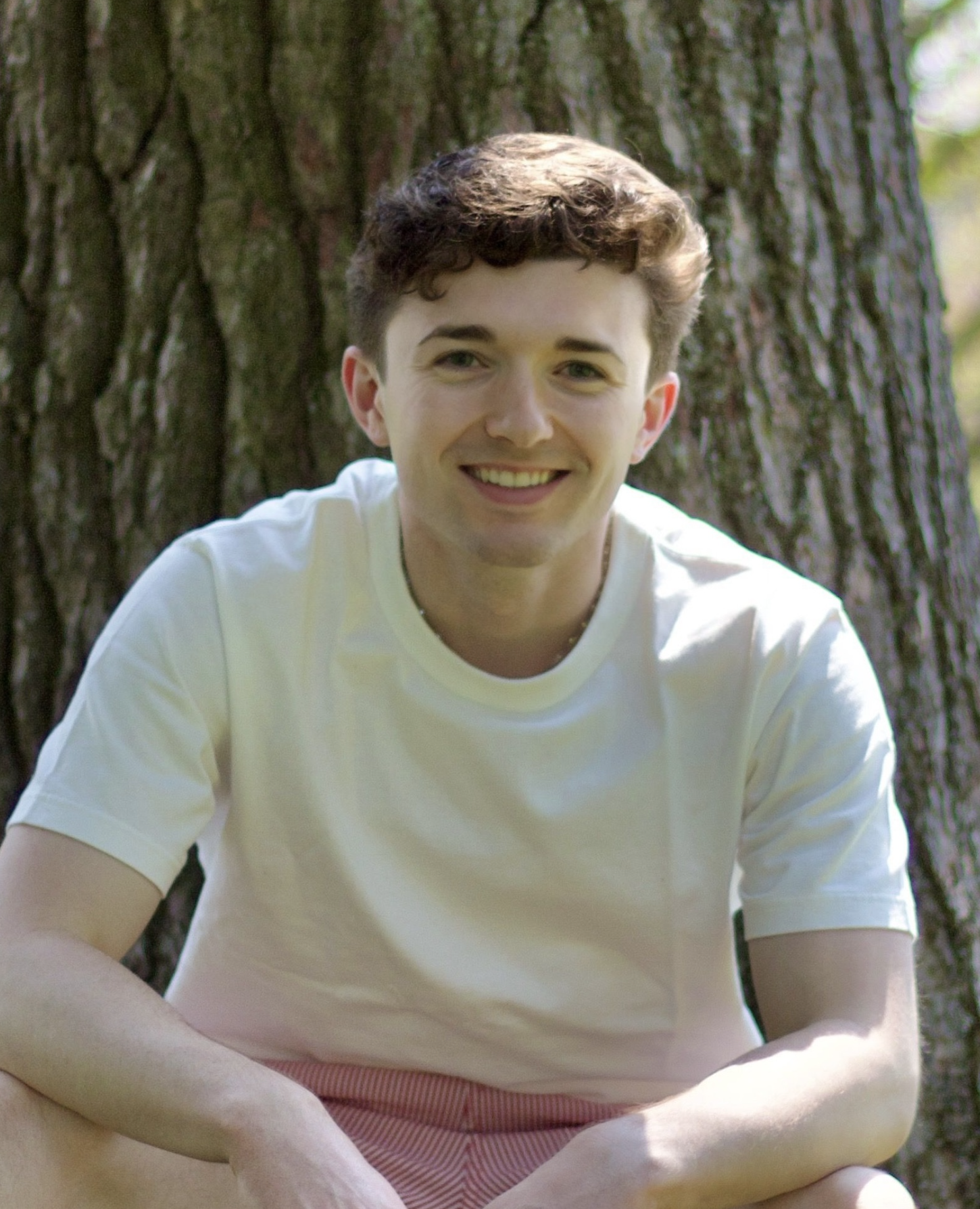 Kirkland Johnson sitting outside in nature Kirkland Johnson sitting outside in nature