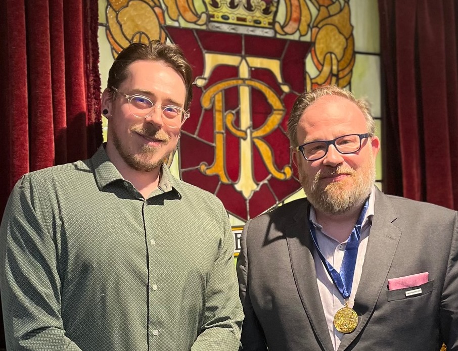 cruickshank-medal-beaulieu Daniel Dishaw congratulates Dr. Michel Beaulieu on his Cruickshank Gold Medal