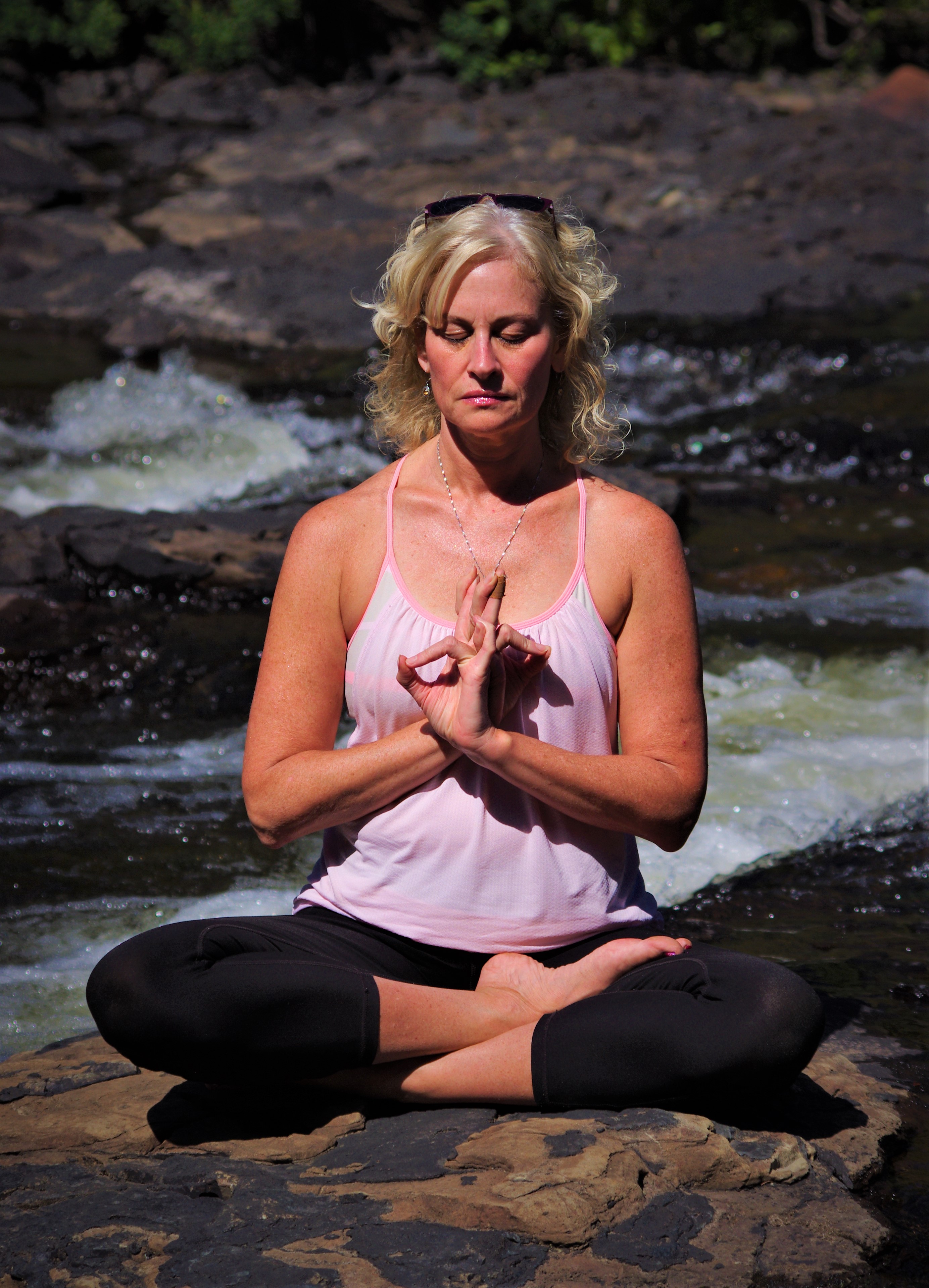 Angela Slomke sitting cross legged