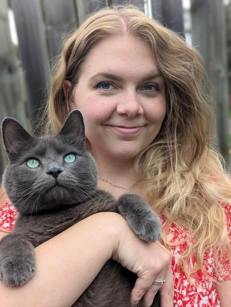 Erika Puiras with a cat